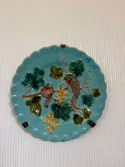 Set of four slurry plates decorated with...
