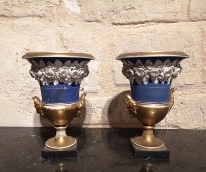 Pair of Medici-style vase planters decorated...