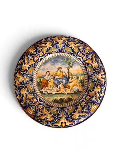 URBINO in style. Rimmed dish depicting a...