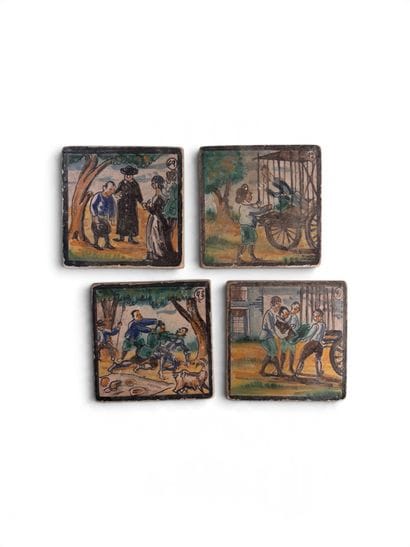 Four stove tiles and five small Delftware...