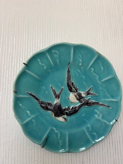 Set of four slurry plates decorated with...