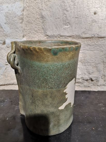 Olive-green ceramic vase with a reserve-decorated...