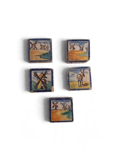 Four stove tiles and five small Delftware...