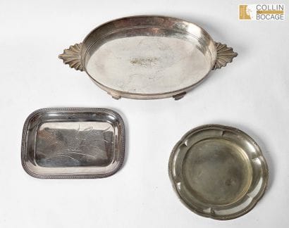 three small silver-plated metal dishes