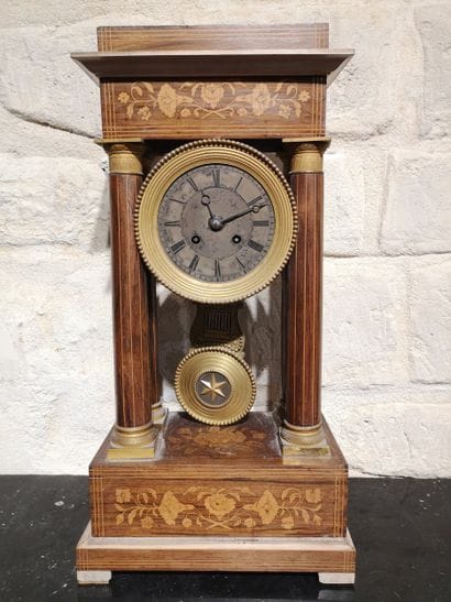 Wood veneer pendulum clock.
Restoration period
48...