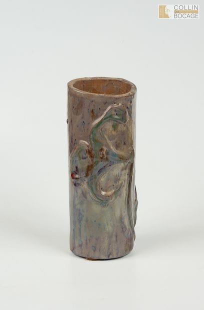 Cylindrical vase decorated with a relief...