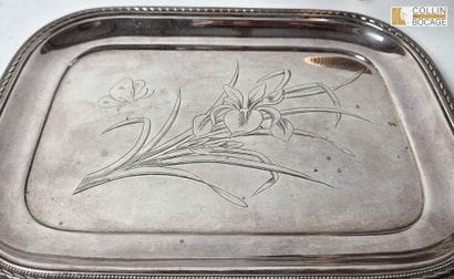 three small silver-plated metal dishes