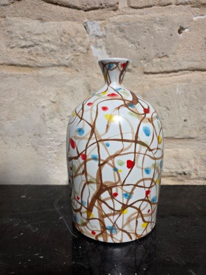 Vase à col serré à décor de serpentin
Fa...