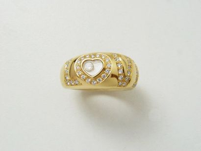 CHOPARD
Bague jonc en or, portant l'inscription...