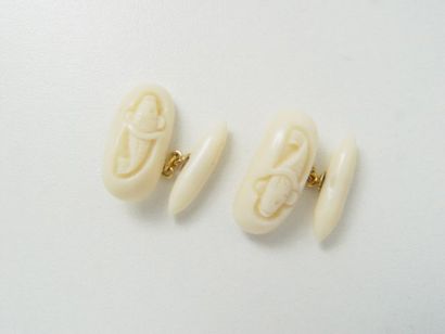 Paire de boutons de manchettes en or, ornés...