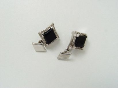 Paire de boutons de manchettes en or, stylisant...