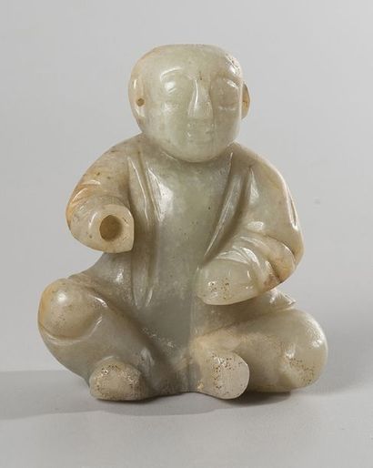 PETITE STATUETTE d'enfant en jade blanc représenté...