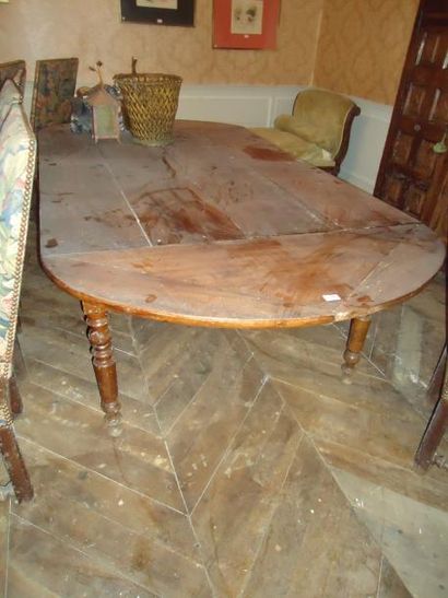 Table ovale en bois, plateau en abattant...