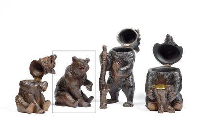 Sitting bear acting as a

as a tobacco pot,

24...