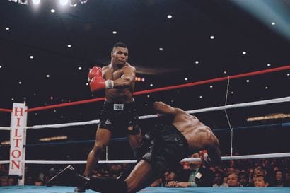 AFP - Carlos SCHIEBECK

Mike Tyson knocks...