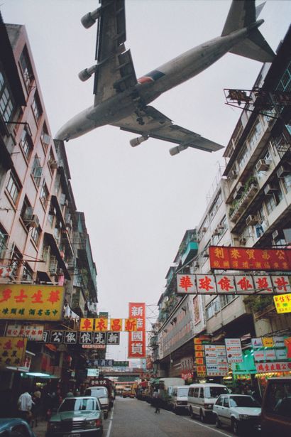 AFP - Tommy CHENG

An airliner flies over...