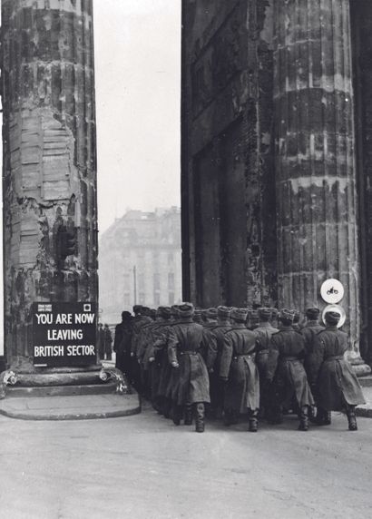 AFP

Soviet soldiers walk under the Brandenburg

Gate...
