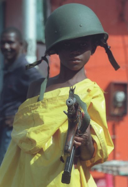 AFP - Joël ROBINE

Child imitation soldiers...