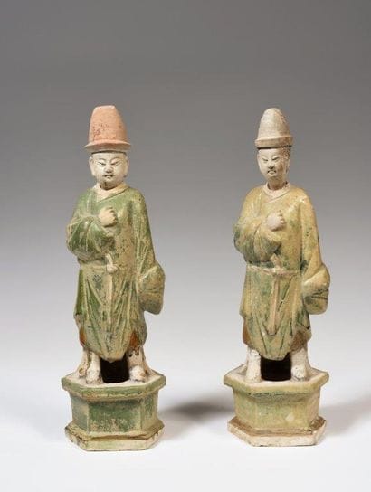 
Deux grandes statuettes en terre cuite émaillée,...