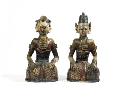 
Deux statuettes en bois polychrome, représentant...