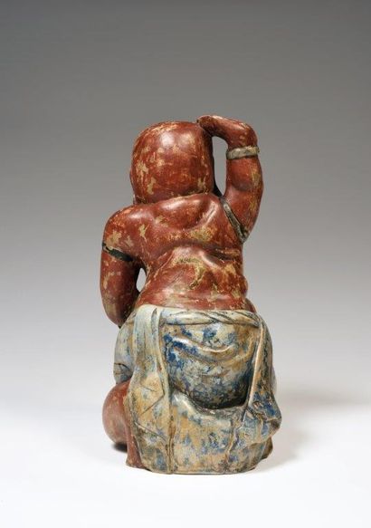 
Statuette en bois, représentant une divinité...