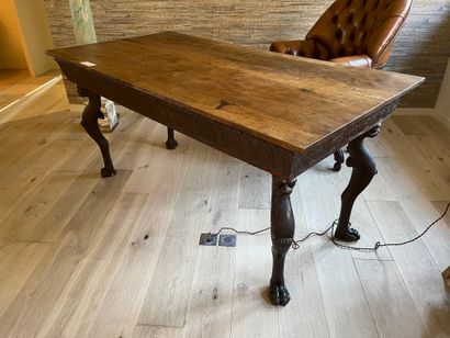 Flat desk in natural wood, the base decorated...