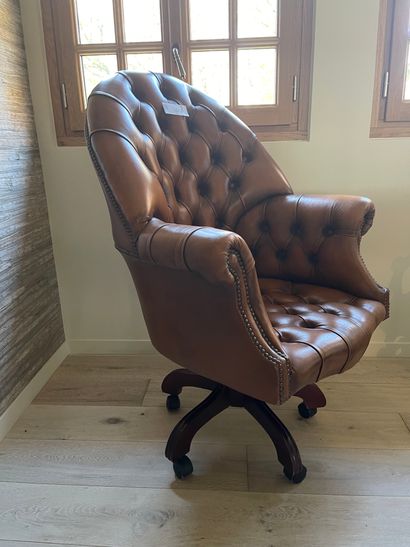 Upholstered leather swivel chair