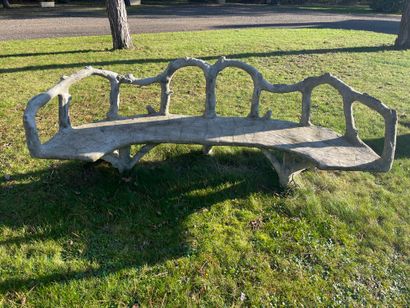 Three reconstituted stone benches simulating...