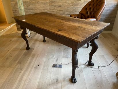 Flat desk in natural wood, the base decorated...