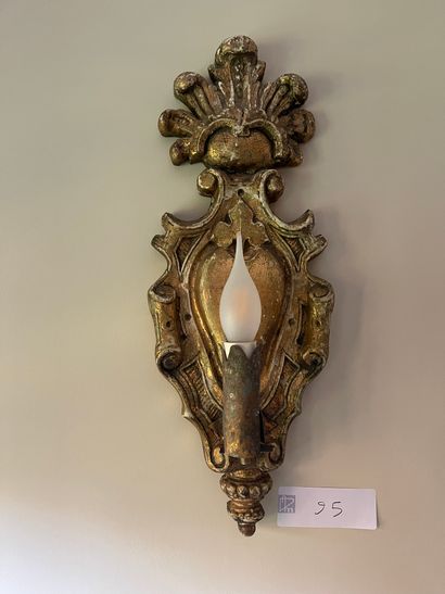 Pair of carved and partially gilded wood...