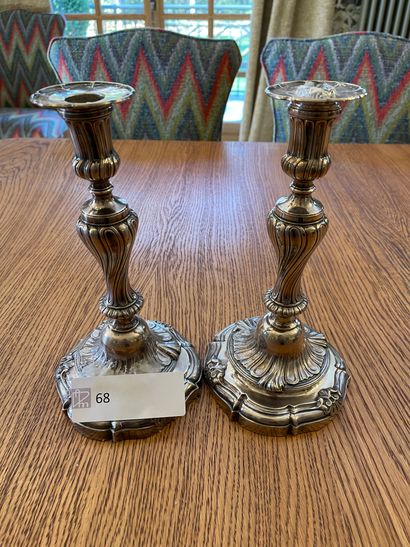 Pair of silver plated candlesticks in the...