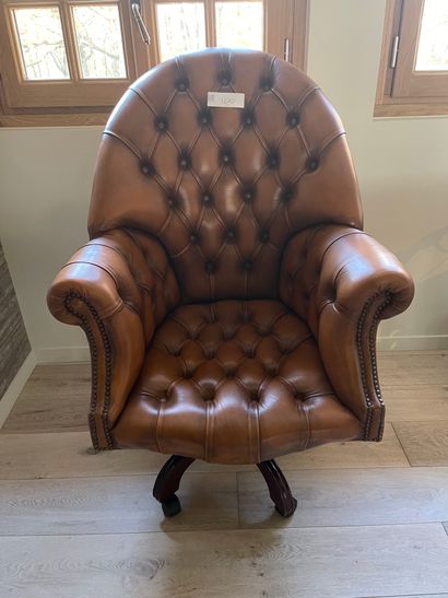 Upholstered leather swivel chair