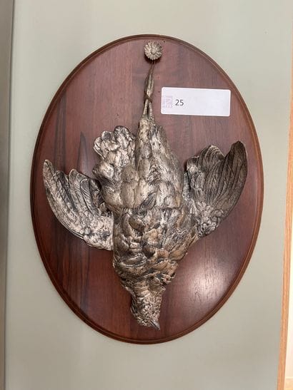Pair of trophies, low relief in silvered...
