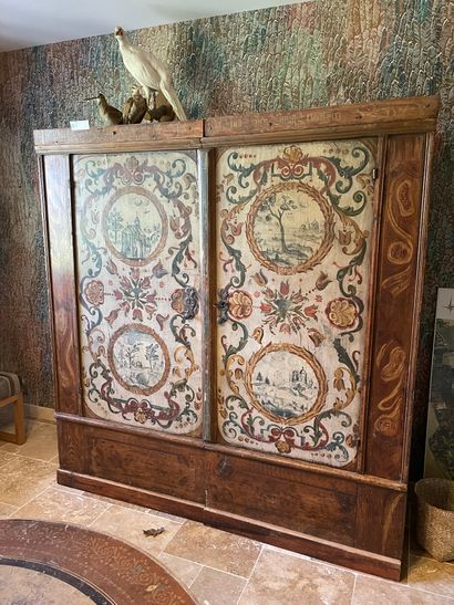 Cupboard with painted foliage scrolls and...