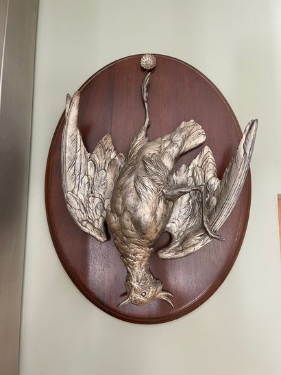 Pair of trophies, low relief in silvered...