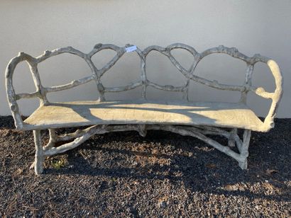 Three reconstituted stone benches simulating...