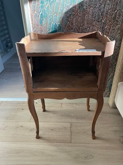 Two bedside tables, one modern, the other...