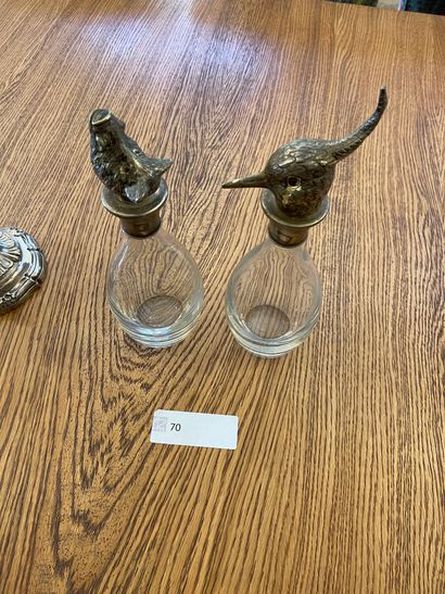 Two decanters with silver-plated metal stopper...