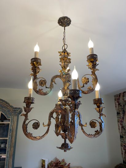 Three chandeliers, two of which form a pair,...