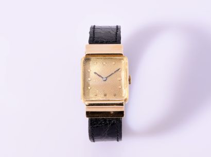 OMEGA
Pink gold (750‰) square MONTRE BRACELET....