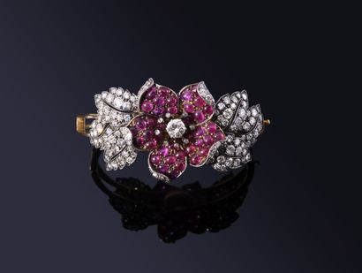 Openwork yellow gold (750‰) and silver (min....