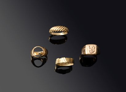 Three yellow gold and rose gold RINGS (750‰)...