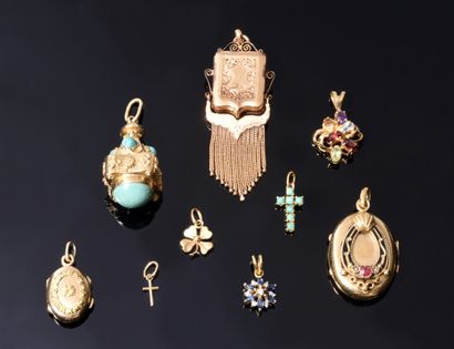 LOT comprising nine PENDANTS in yellow gold...