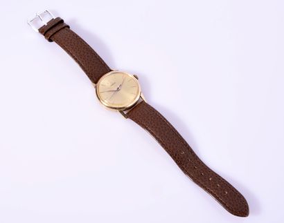 OMEGA
BRACELET MONTRE round in yellow gold...