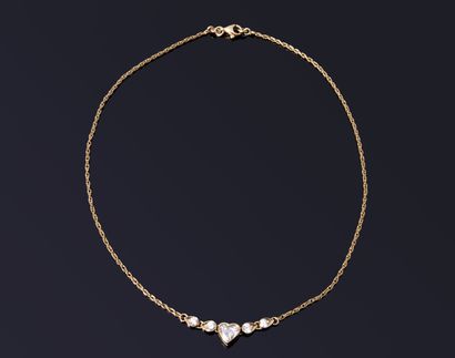 COLLAR in yellow gold (750‰) holding a close-set...