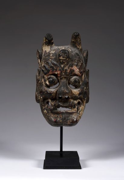 Nuo theater mask most likely featuring
probably...