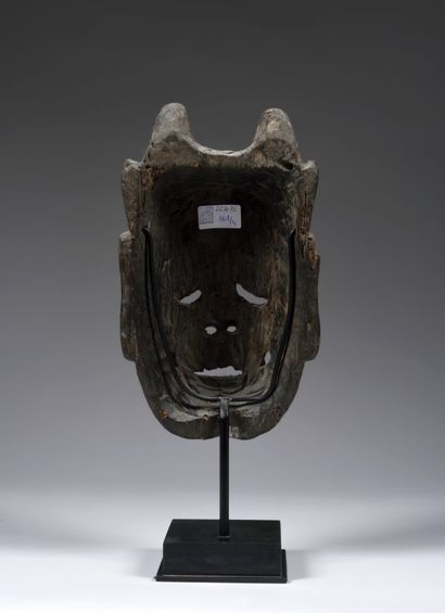 Nuo theater mask most likely featuring
probably...