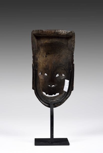 Nuo theater mask depicting Tudigong the
god...