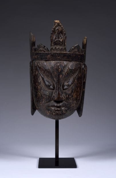 Nuo theater mask most likely featuring
probably...
