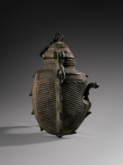 Fruit-shaped container, probably a mango
India,...